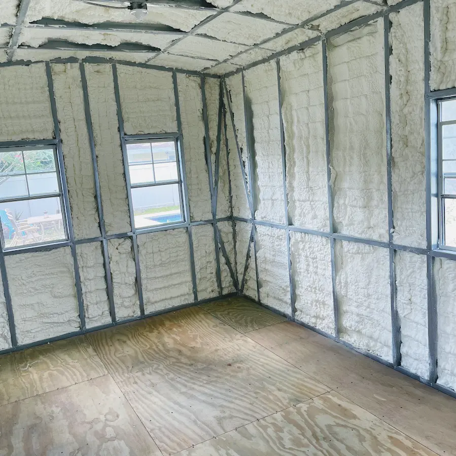 Closed-cell spray foam insulation applied to wall cavities in a residential project in Irondale